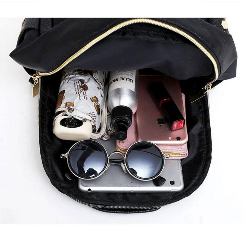 New fashion backpack backpack black ladies nylon rivet bag college wind travel bag Mochila