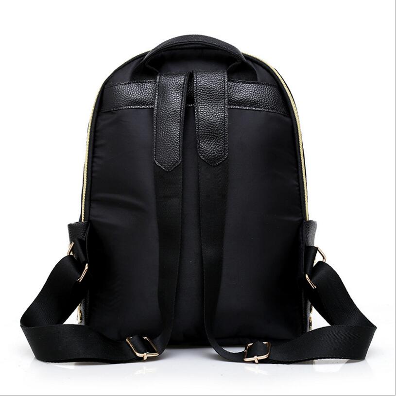 New fashion backpack backpack black ladies nylon rivet bag college wind travel bag Mochila